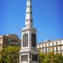 obelisco-na-plaza-de-la-merced-quadrado-de-merced-em-malaga-espanha-61367557-3967380832.jpeg